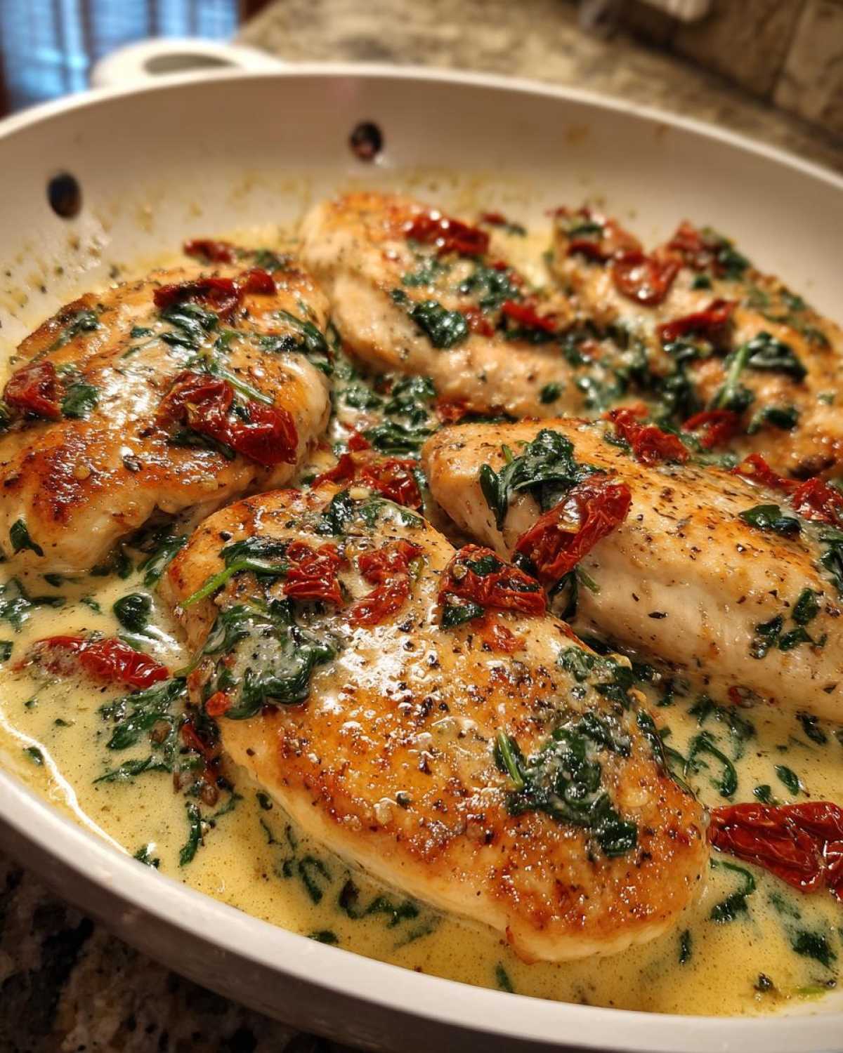 Four golden-brown One-Pan Creamy Garlic Butter Turkey Cutlets simmering in a rich, creamy sauce with spinach and sun-dried tomatoes.